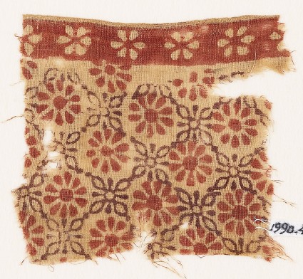 Textile fragment with rosettes and linked quatrefoilsfront