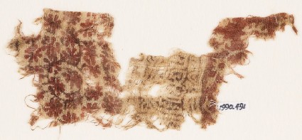 Textile fragment with rosettes, flower-heads, arches, and tendrilsfront