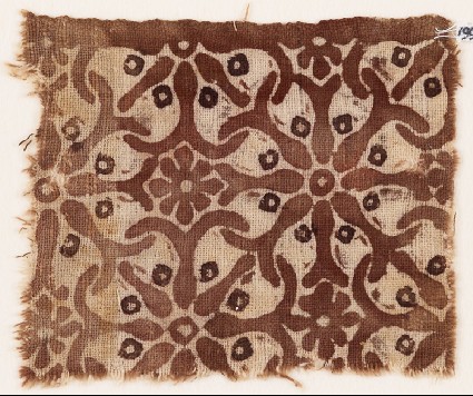 Textile fragment with interlocking spirals or rosettesfront