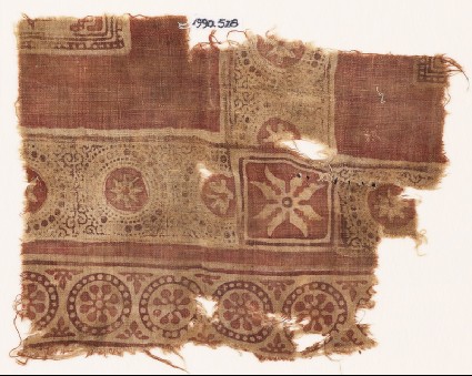 Textile fragment with rosettes in dotted framesfront