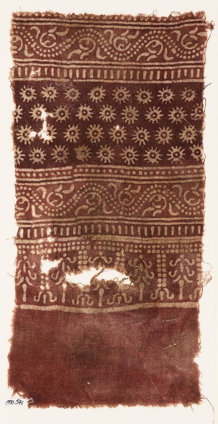 Textile fragment with bands of dotted vines, tendrils, rosettes, and stylized treesfront