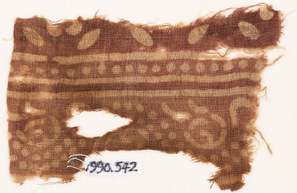 Textile fragment with dots and leavesfront