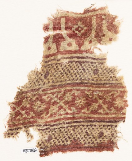 Textile fragment with bands of arches or stupas, dots, and crosses made of tendrilsfront