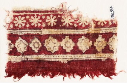 Textile fragment with bands of rosettes, diamond-shapes, stepped squares, and starsfront