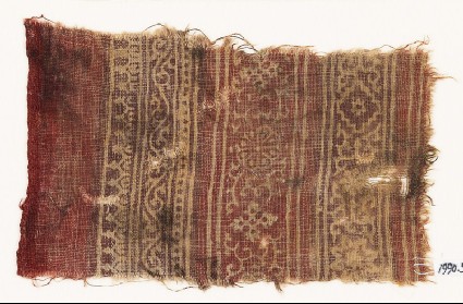 Textile fragment with vine, rosettes, tendrils, stars, and diamond-shapesfront
