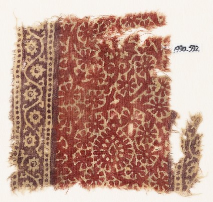 Textile fragment with scroll, flower-heads, and rosettesfront