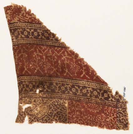 Textile fragment with bands of stylized plants, rosettes, and tendrilsfront