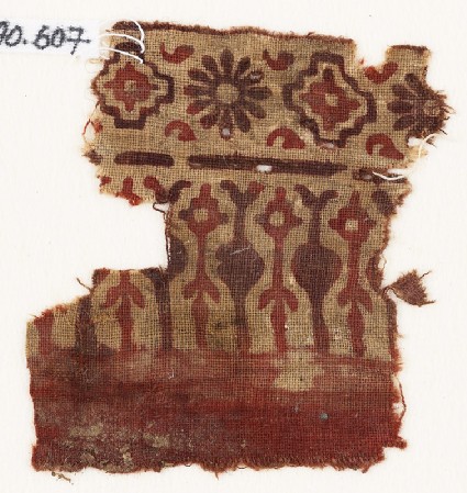 Textile fragment with stylized trees or leaves, rosettes, and stepped squaresfront