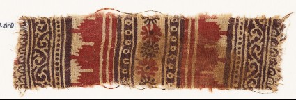 Textile fragment with bands of vines and tendrils, crenellations, rosettes, and dotsfront
