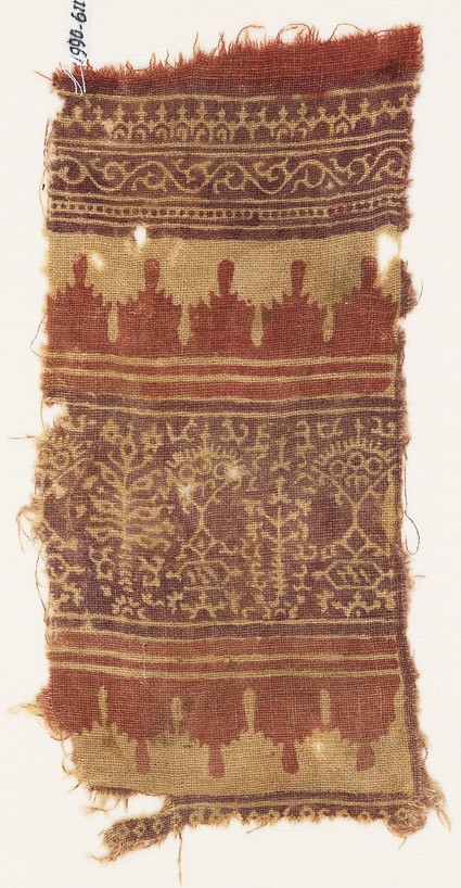Textile fragment with bands of stylized trees, crenellations, vine, and archesfront