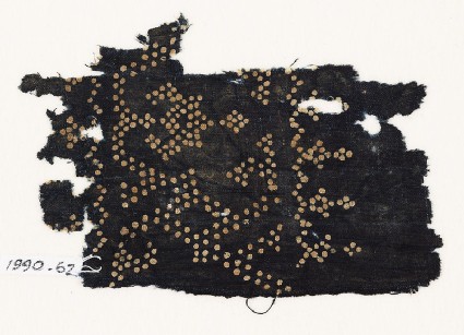 Textile fragment with dots arranged as a band, possibly with a vase shapefront