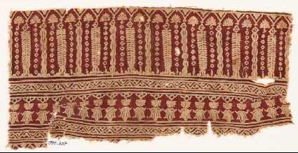 Textile fragment with arches, columns, and flower-headsfront