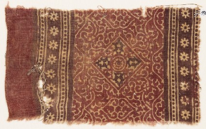 Textile fragment with tendrils, square, and rosettesfront