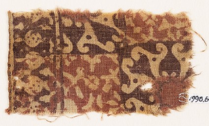 Textile fragment with squares, spirals, and possibly tendrilsfront