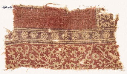 Textile fragment with stylized plants, crossed tendrils, and flowersfront