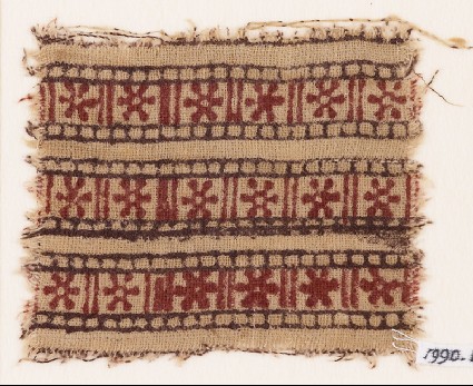 Textile fragment with bands of rosettes and linesfront