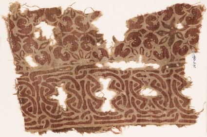 Textile fragment with interlace and interlocking rosettesfront