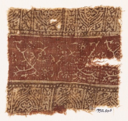 Textile fragment with crossed tendrils, flowers, and archesfront