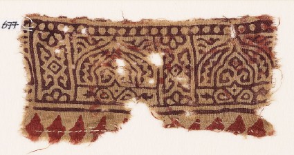Textile fragment with arches and floral designsfront