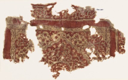 Textile fragment with medallion, floral patterns, and Persian-style scriptfront