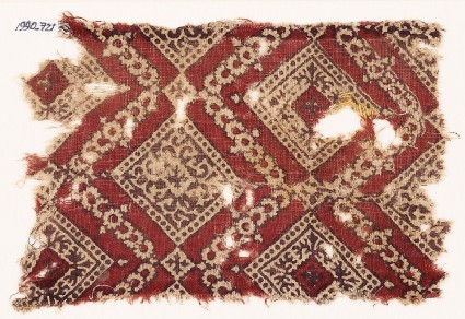 Textile fragment with squares, tendrils, and crossesfront