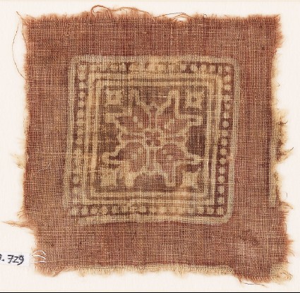 Textile fragment with dotted square and rosettefront