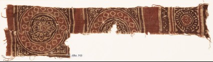 Textile fragment with squares, circles, and rosettesfront