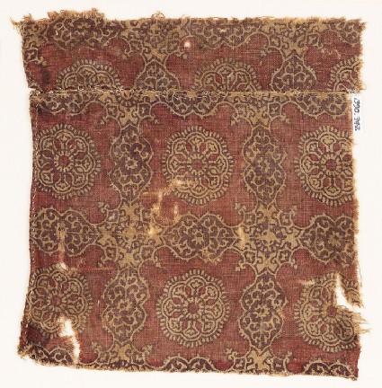 Textile fragment with linked cartouches and starsfront