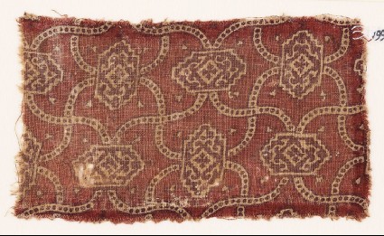 Textile fragment with linked medallions and cartouchesfront