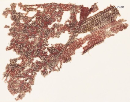 Textile fragment with interlacing tendrils and quatrefoilsfront