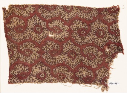 Textile fragment with tendrils and flower-headsfront