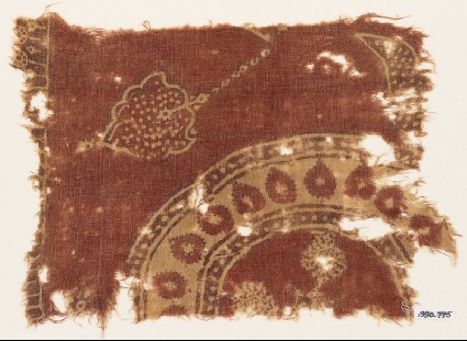 Textile fragment with part of a large circle and leavesfront