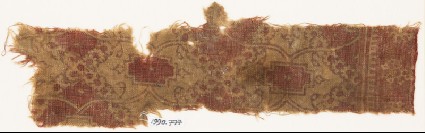 Textile fragment with cartouches, tendrils, and rosettesfront