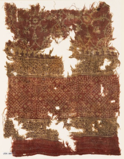 Textile fragment with bandhani, or tie-dye, imitation and interlace medallionsfront
