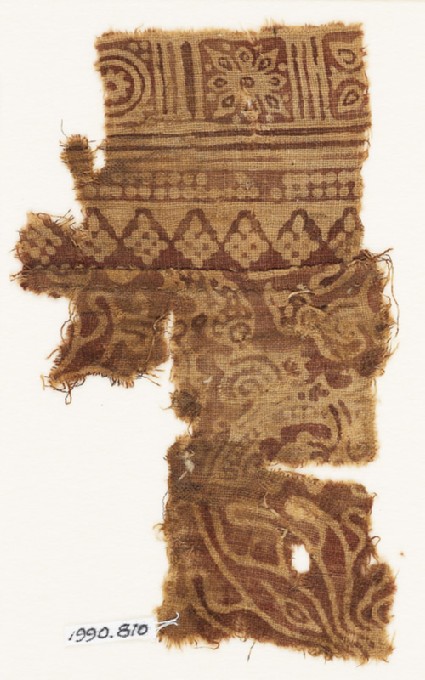Textile fragment with leaves, squares, and rosettesfront