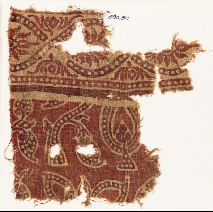 Textile fragment with dotted leaves, interlace, and flowersfront
