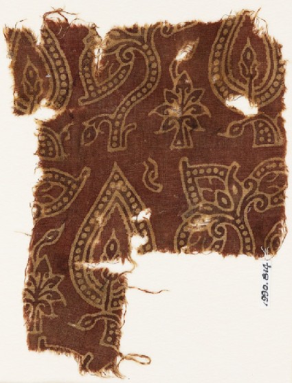Textile fragment with stylized, dotted leavesfront