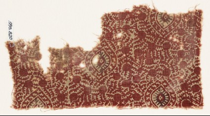 Textile fragment with oval medallions, tendrils, and possibly berriesfront