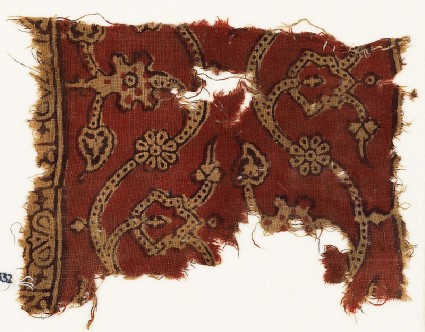 Textile fragment with dotted tendrils, leaves, and rosettesfront