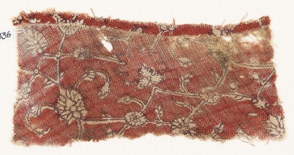 Textile fragment with interlacing tendrils, rosettes, and flower-headsfront