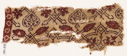 Textile fragment with interlacing tendrils, flowers, and heartsfront