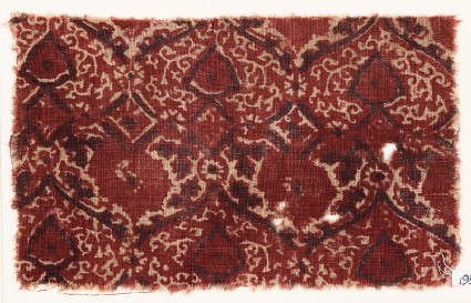 Textile fragment with heart-shaped flower-heads and tendrilsfront