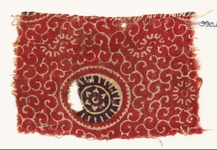 Textile fragment with large rosette and tendrilsfront