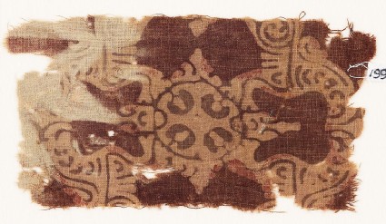 Textile fragment with ornate quatrefoil or medallionfront