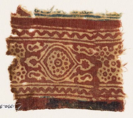 Textile fragment with medallion and linked starsfront
