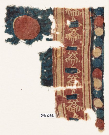 Textile fragment with stylized shapes, possibly birdsfront