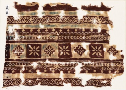 Textile fragment with bands of squares, diamond-shapes, and rosettesfront