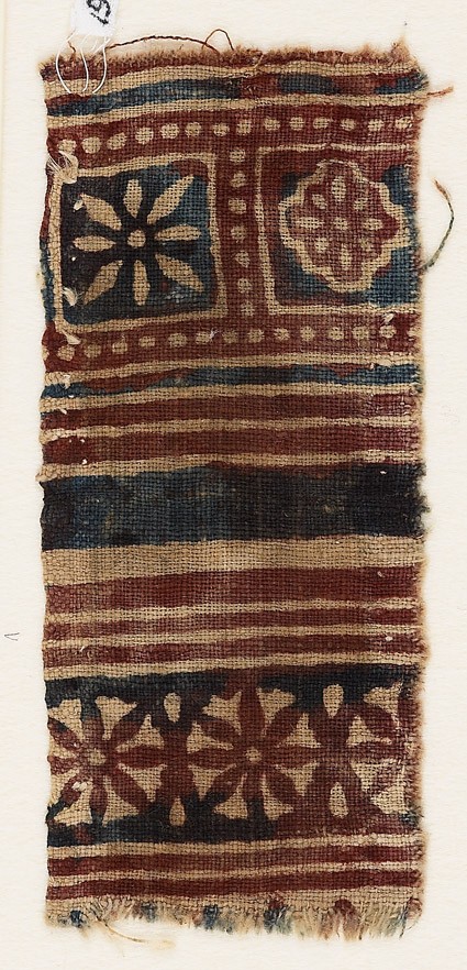 Textile fragment with squares and rosettesfront