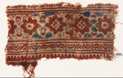 Textile fragment with flower-headsfront