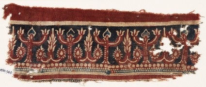 Textile fragment with flowering treesfront